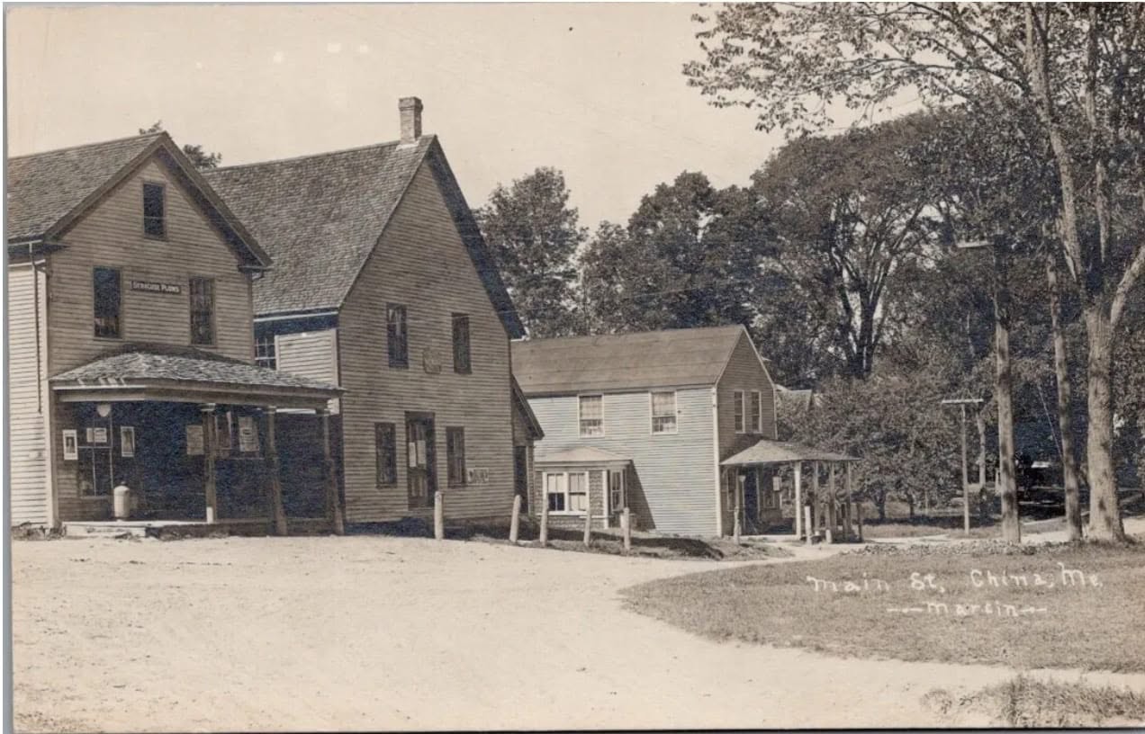 Storefronts on Main Street, China Village, Maine, early 1900s